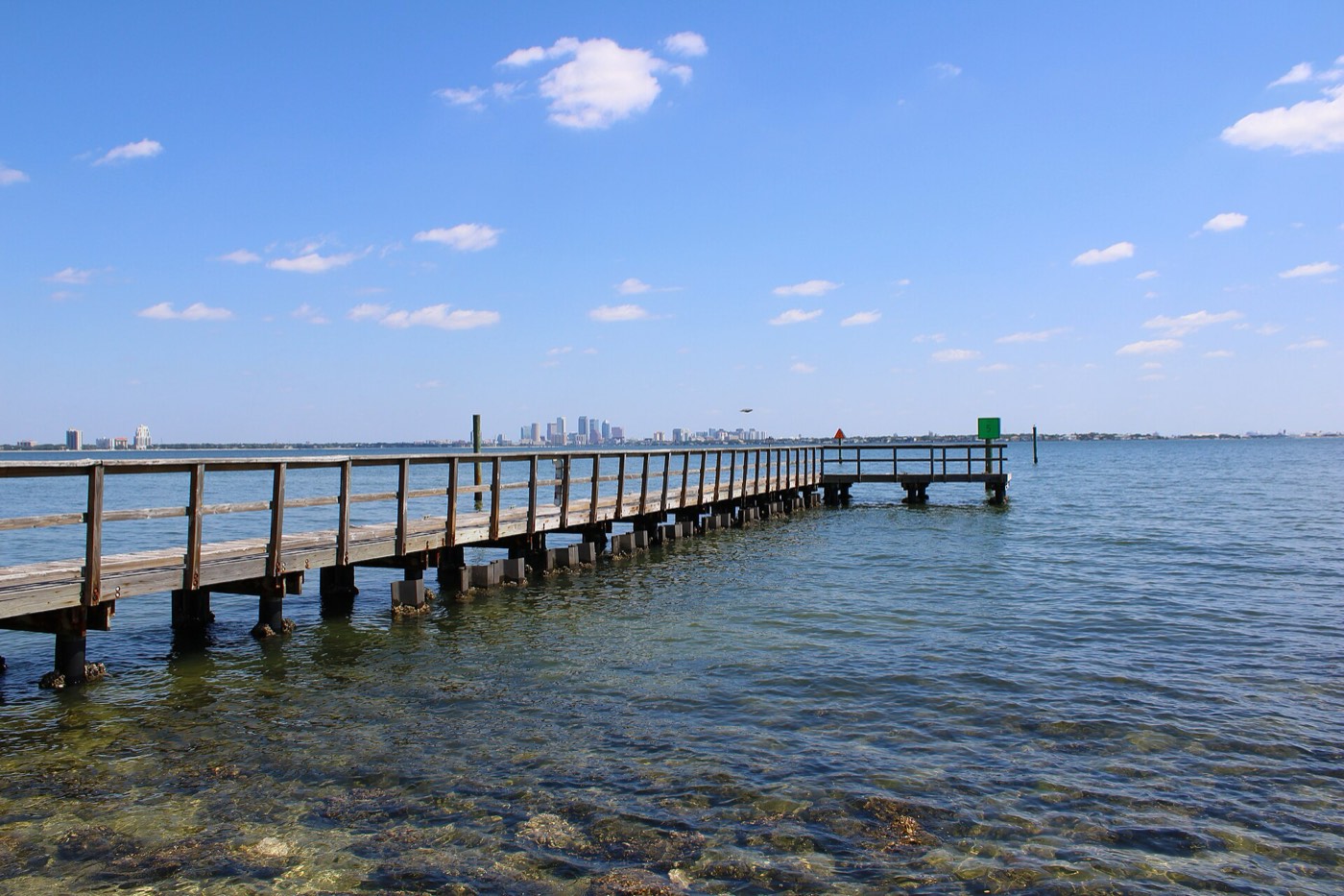 Tampa skyline seen across the bay from the pier at Ballast Point Park